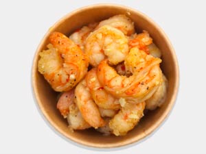 Garlic shrimp pasta with creamy sauce and fresh herbs, seafood specialty at Pastasole New York